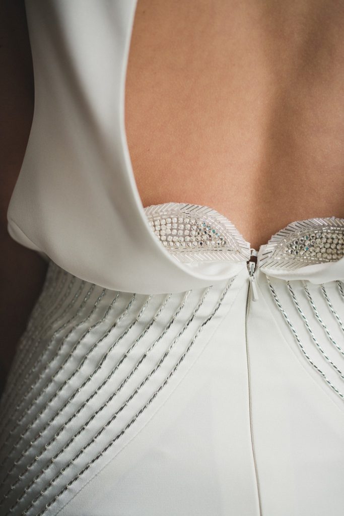 Crystal details on the hips of the vintage inspired Heathe wedding dress by Edith Élan