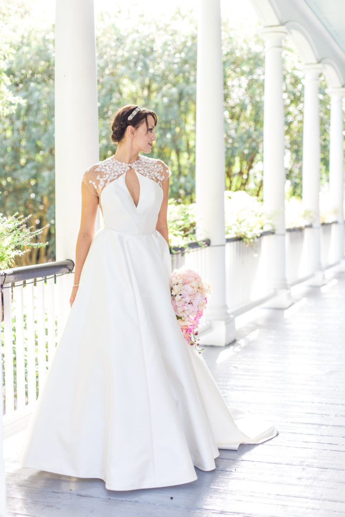 Illusion neckline ballgown wedding dress with pockets at The Governor Thomas Bennett House in Charleston SC