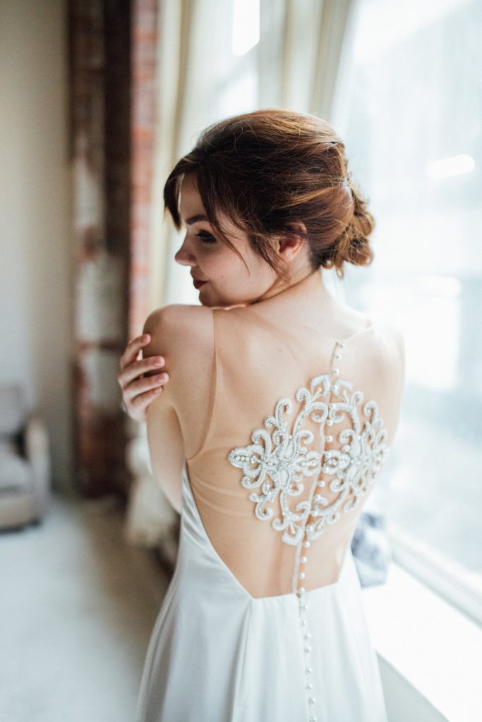 Sparkling crystal embroidery on the Iset illusion back wedding dress by Edith Élan