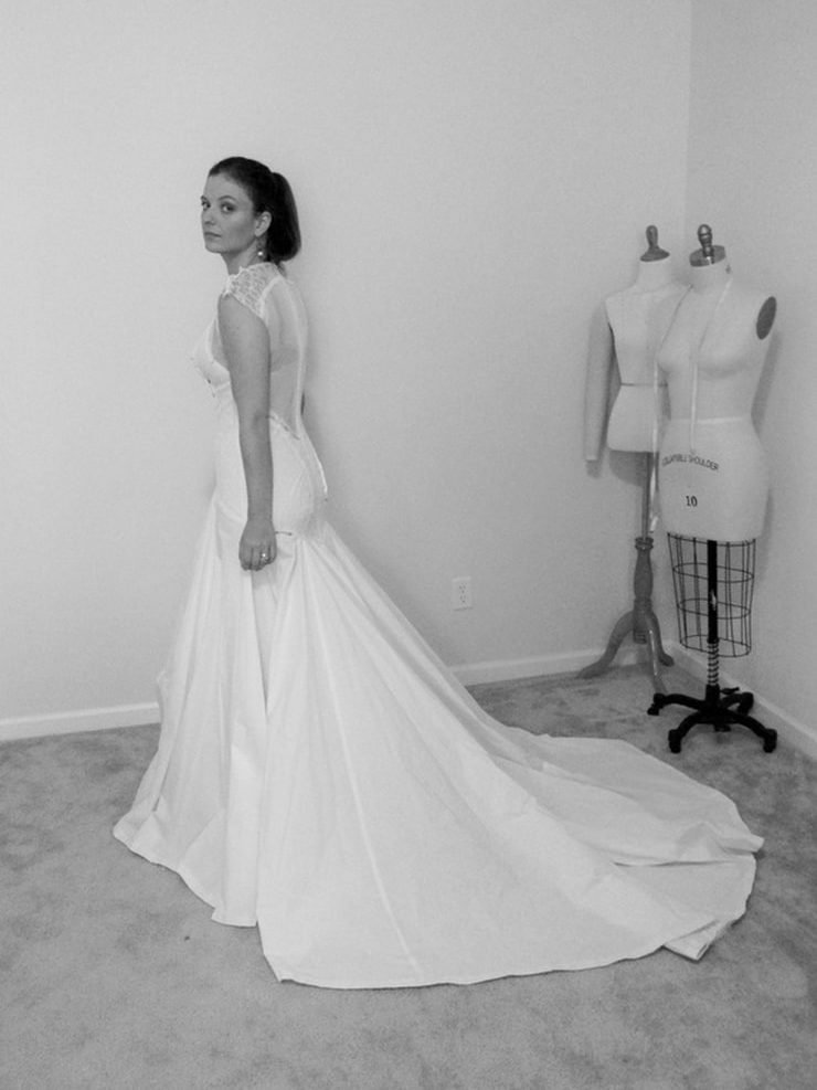 Model wearing a muslin of a wedding dress style from an Edith Élan collection