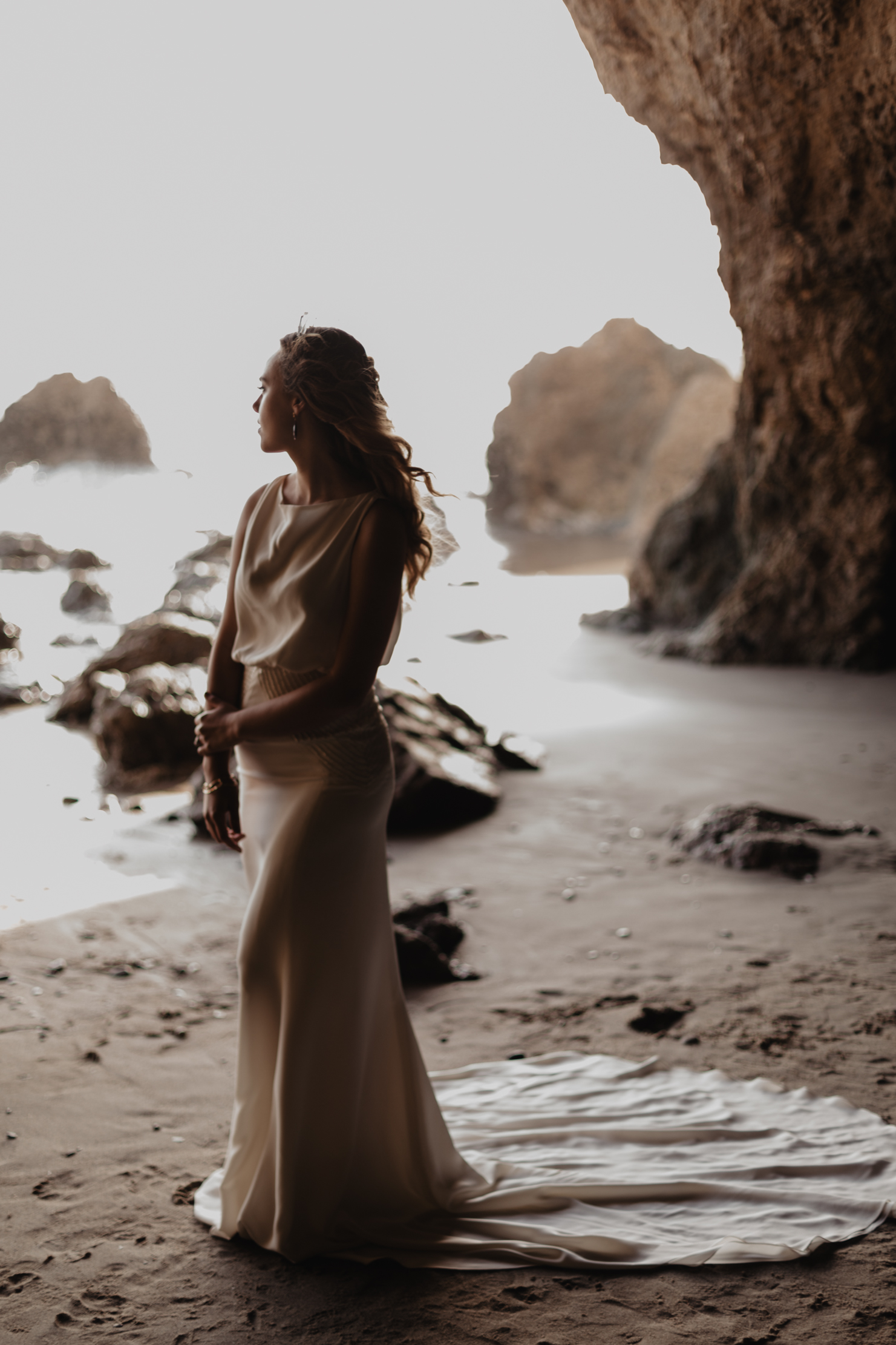 The archived Heathe wedding dress style by Edith Elan photographed at El Matador State Beach in Malibu California