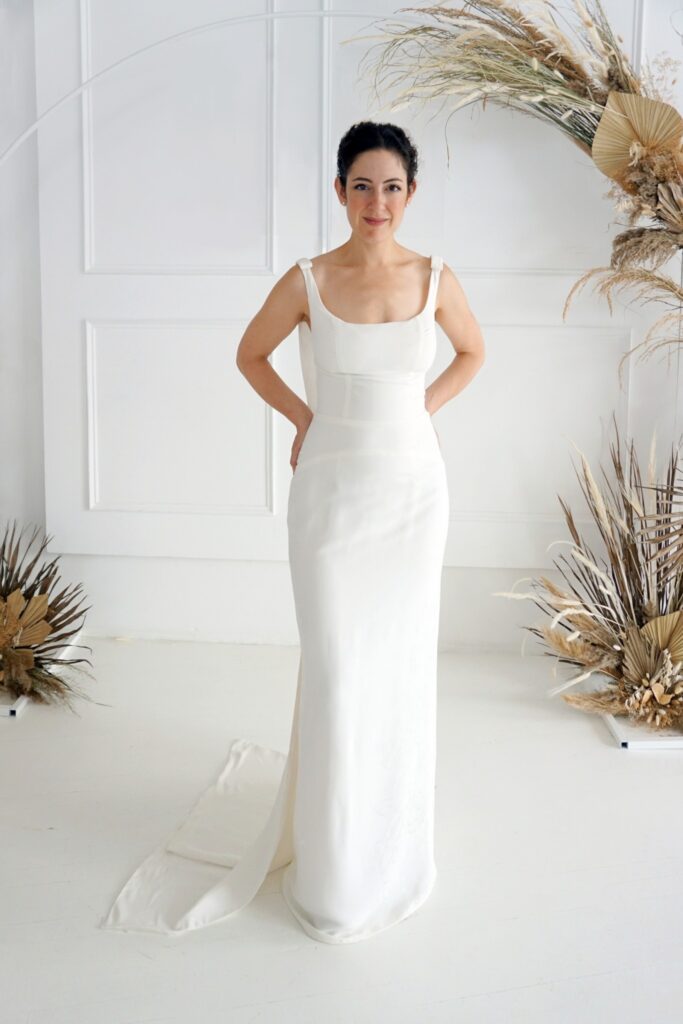 Floral jacquard crepe two-in-one wedding dress with detachable trains.