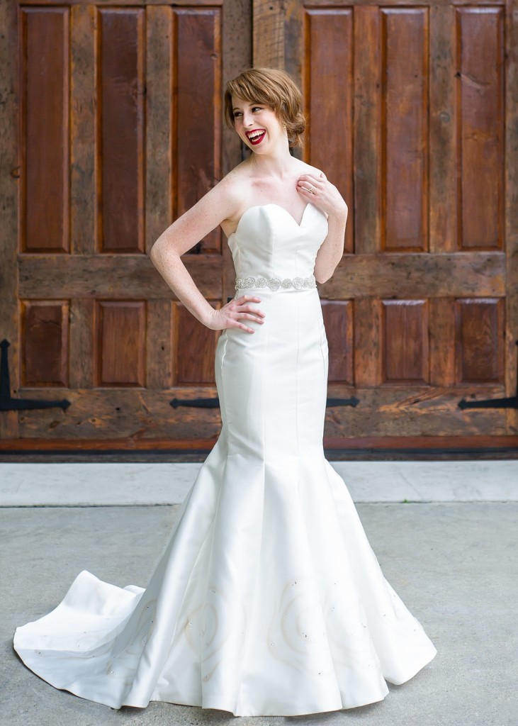 Pilar by Edith Elan is a strapless mermaid wedding dress with hand painted rosettes on the skirt.