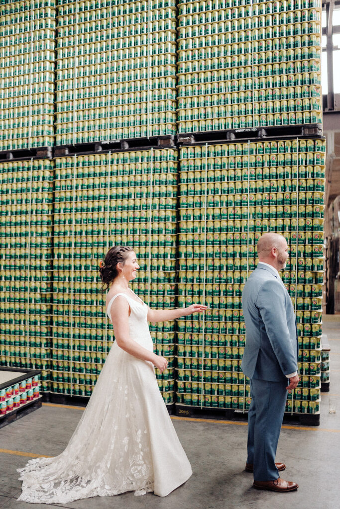 Bride and groom first look during their Asheville brewery wedding