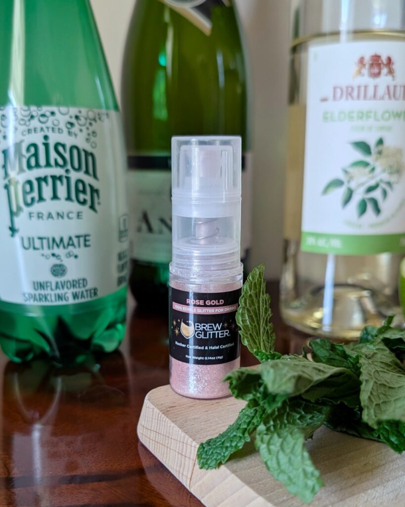 Hugo Spritz cocktail variation by Edith Élan includes edible Brew Glitter in Rose Gold.