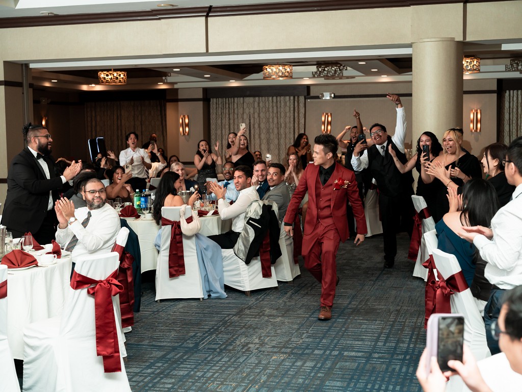 Groom surprises guests with fresh haircut for wedding reception. Flushing Queens.