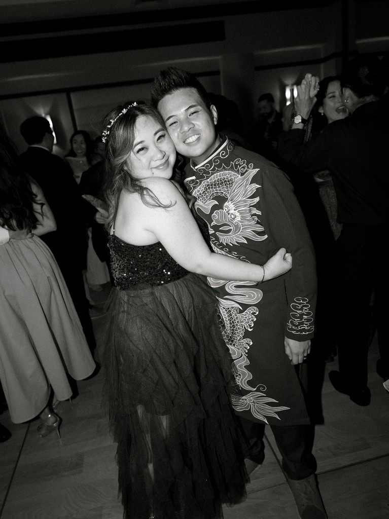 Black and white portrait of newlyweds during the wedding reception.