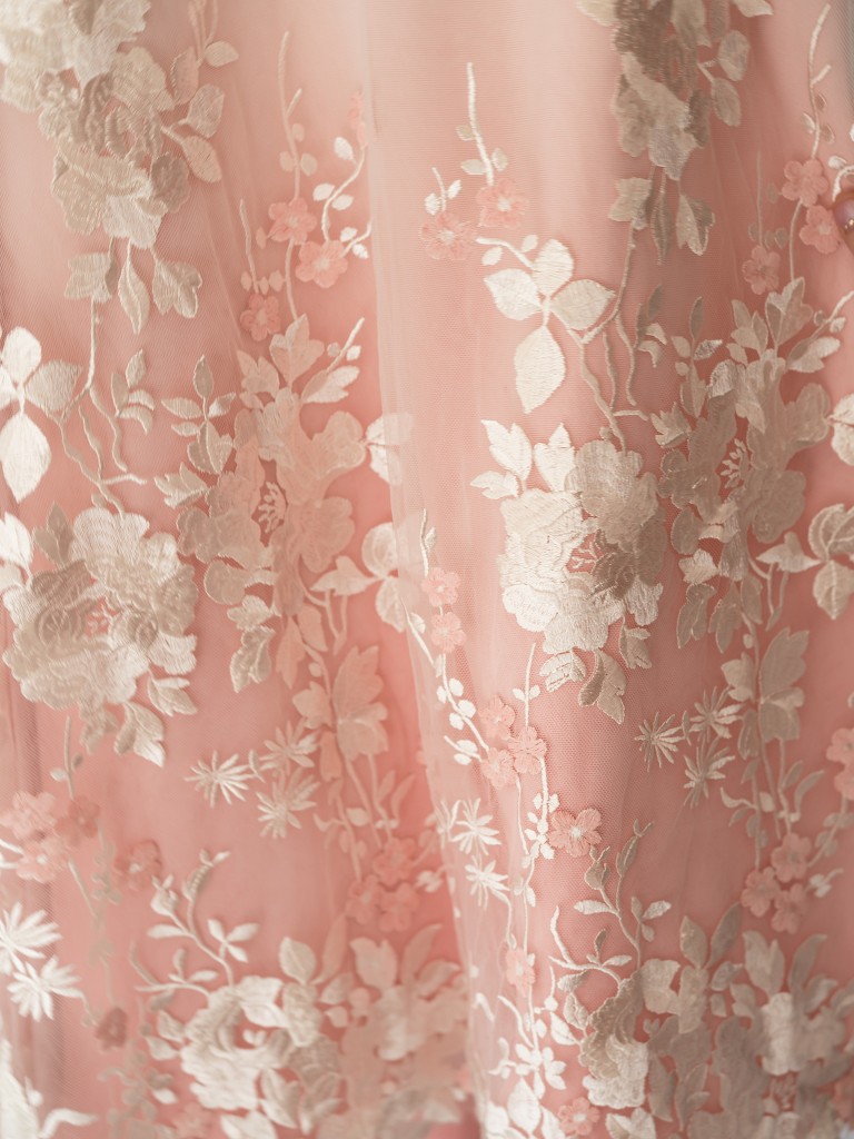 Details of the custom blush and lace wedding dress by bridal designer Edith Élan for a NYC bride.