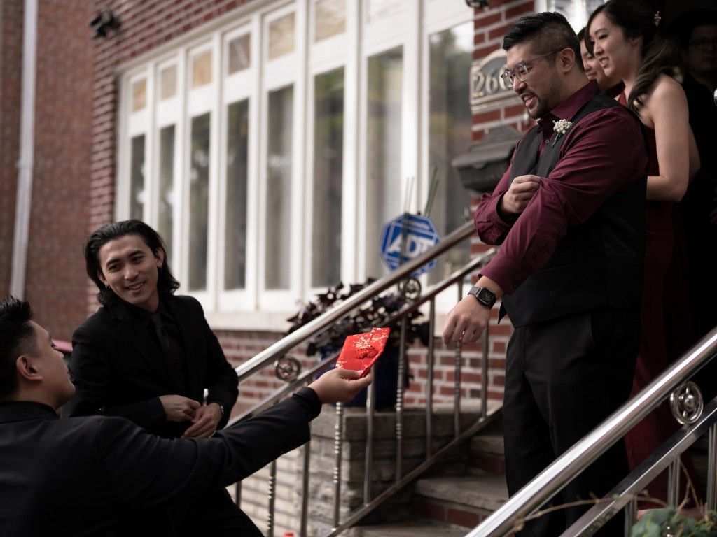 Chinese wedding door game: no money, no honey red envelopes.