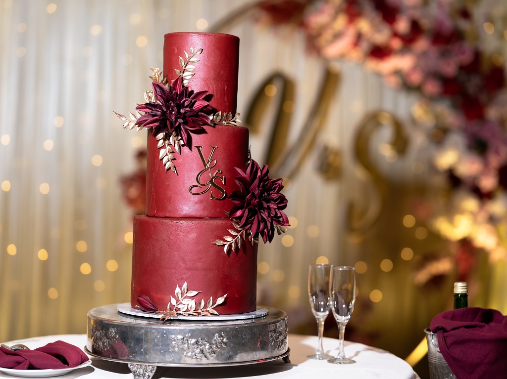 Three-tier red and gold wedding cake. Flushing Queens Asian American wedding.