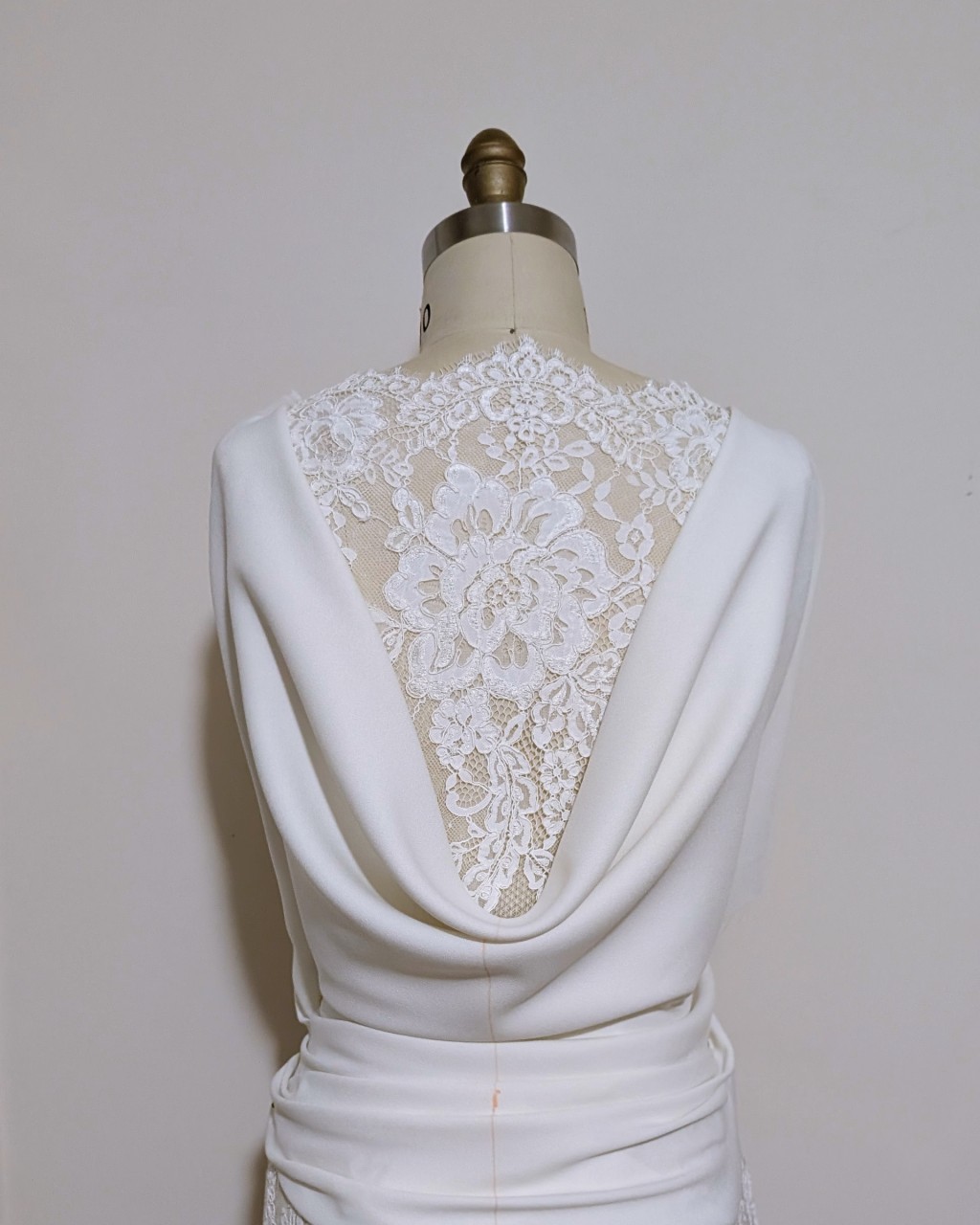 Custom bridal design process: the muslin mockup of a bridal jumpsuit bodice.